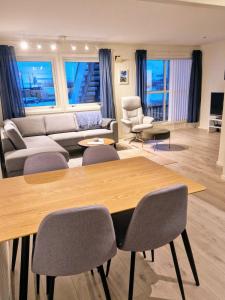 Posezení v ubytování 2 bedroom apartment near Tromsø + 9 fotografií