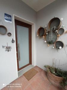 a room with pots and pans on the wall at Casa Vintago b&b in Savio di Ravenna