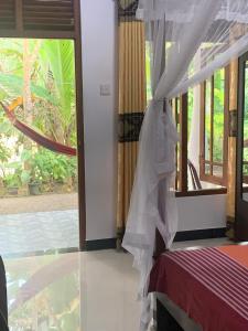 Ліжко або ліжка в номері Bakery Family Guest House