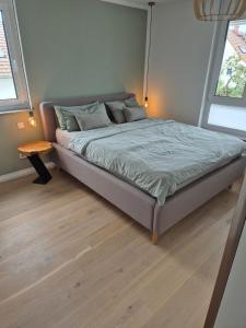 Postel nebo postele na pokoji v ubytování FeWo Bodensee Base