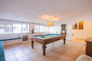 a large room with a pool table in it at Spectacular house in Vence
