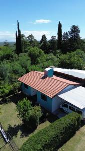 an overhead view of a house with a red roof at Las Calandrias in Valle Hermoso
