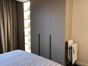 Postel nebo postele na pokoji v ubytování Stylish 2BDR apartment Gramada, free parking