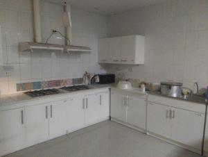 Η κουζίνα ή μικρή κουζίνα στο Bento Hostel