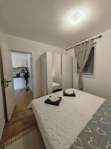 Krevet ili kreveti u jedinici u okviru objekta Apartman ELIT Srebrno jezero