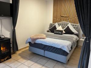 Ένα ή περισσότερα κρεβάτια σε δωμάτιο στο Nordseebude +14 φωτογραφίες