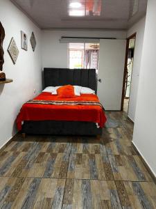 Postel nebo postele na pokoji v ubytování CASA NARANJA SALENTO + 2 fotografie