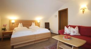 Cama o camas de una habitación en Hotel-Garni Schernthaner