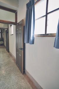 Φωτογραφία από το άλμπουμ του Old wooden window bungalow B&B σε Tainan