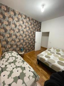 Postel nebo postele na pokoji v ubytování Appart 7 personnes centre-ville