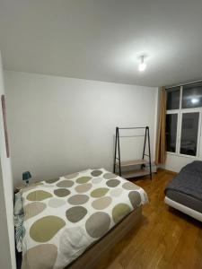 Postel nebo postele na pokoji v ubytování Appart 7 personnes centre-ville