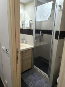 Koupelna v ubytování Konaci Kopaonik Lux Apartmani + 33 fotografií