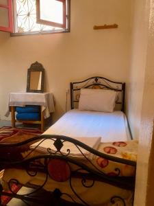 Voodi või voodid majutusasutuse Dar Relax Hostel, Gorges de Todra toas