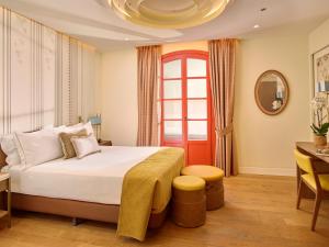 Ein Bett oder Betten in einem Zimmer der Unterkunft Hotel El Pilar Andalucia