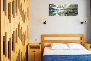 Postel nebo postele na pokoji v ubytování Room310