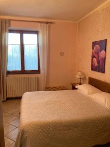 Postel nebo postele na pokoji v ubytování Casa Milena