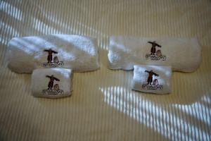 Postel nebo postele na pokoji v ubytování Hotel Mogzauri