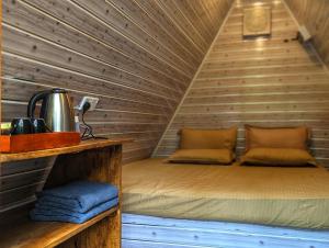 Postel nebo postele na pokoji v ubytování Sudagala Jungle Glamping