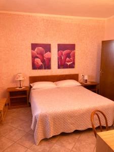 Postel nebo postele na pokoji v ubytování Casa Milena