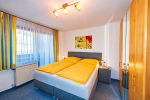 Łóżko lub łóżka w pokoju w obiekcie Ferienwohnung Franck
