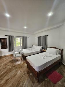 Postel nebo postele na pokoji v ubytování JP Self Catering