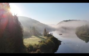 a view of a river with fog on the water at Idyllic Lake House - 4 rooms & 2 Glamping Tents Available in Porsgrunn +61 photos