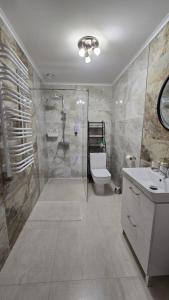 Kúpeľňa v ubytovaní Woodland - Apartments & SPA Łagów