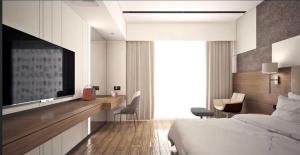 Hotel NOAH SPIRE客房内的一张或多张床位