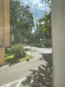 a view from a window of a courtyard at Apartament Kołobrzeg in Kołobrzeg