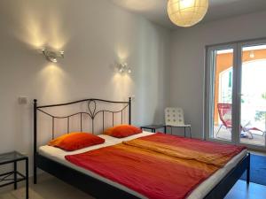 Postel nebo postele na pokoji v ubytování Villa Asteroi'dea - Tiha Mala