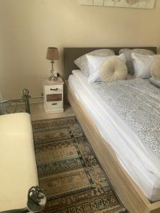 Postel nebo postele na pokoji v ubytování ULMA Residenz Peine