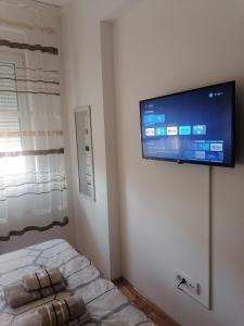 Postel nebo postele na pokoji v ubytování Apartman Zapadni Kej Pirot + 13 fotografií