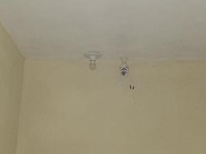 a ceiling with a light in a room at Próximo ao centro de Cotia in Cotia +6 photos