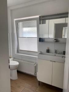 Koupelna v ubytování ULMA Residenz Peine + 26 fotografií