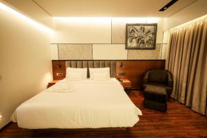Hotel NOAH SPIRE客房内的一张或多张床位