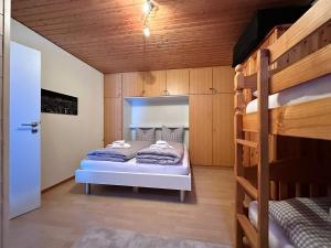 Ένα ή περισσότερα κρεβάτια σε δωμάτιο στο ImbergSuite +2 φωτογραφίες