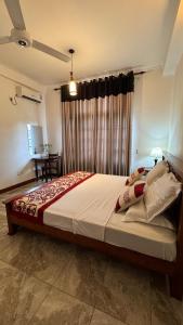 Ένα ή περισσότερα κρεβάτια σε δωμάτιο στο T51 Hanthane