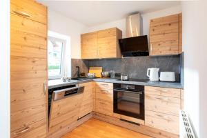 Cucina o angolo cottura di Apartments Sopherl - by myNests