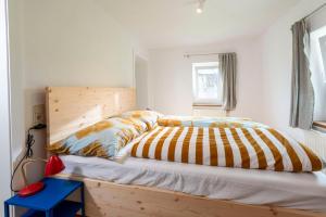 Letto o letti in una camera di Apartments Sopherl - by myNests
