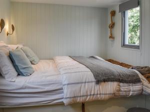 Ένα ή περισσότερα κρεβάτια σε δωμάτιο στο Shepherd's Beachhouse