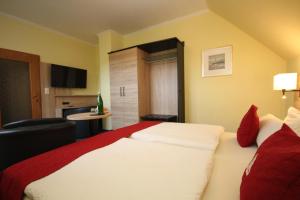 Postel nebo postele na pokoji v ubytování Hotel Morgensonne garni