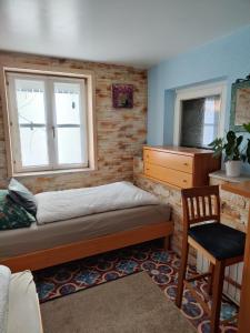 Postel nebo postele na pokoji v ubytování Gemütliches 2 Bettzimmer mit Gemeinschaftsbad und kleiner Küche