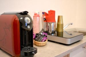 a coffee maker sitting on a kitchen counter at Dolce Vita House in Pontecagnano
