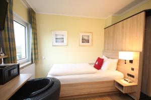 Postel nebo postele na pokoji v ubytování Hotel Morgensonne garni