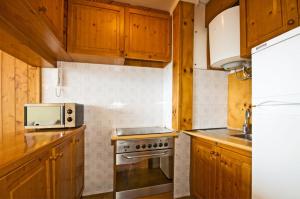 Kuchyň nebo kuchyňský kout v ubytování Karolina Alcudia