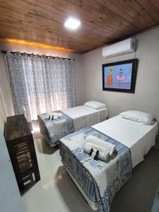 Postel nebo postele na pokoji v ubytování La Posada de Dante