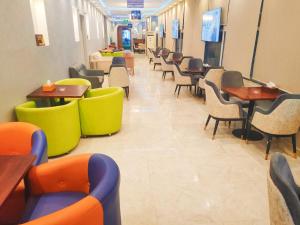 Posezení v ubytování sun rise hotel راس الخيمة