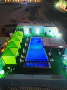 Bazén v ubytování sun rise hotel راس الخيمة nebo v jeho okolí