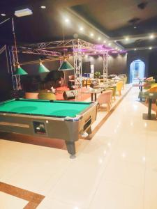 Biliár nebo kulečník v ubytování sun rise hotel راس الخيمة
