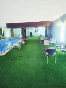 Bazén v ubytování sun rise hotel راس الخيمة nebo v jeho okolí
